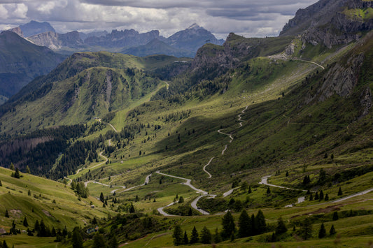 View of a road going across a valley with mountains