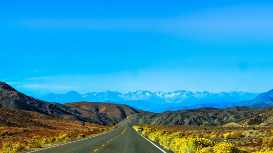 Open highway with mountains in the distance