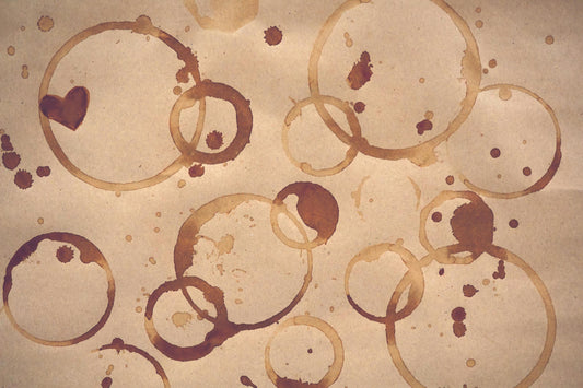 Coffee stains on a sheet of paper.